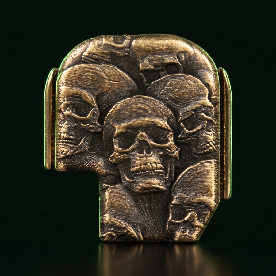 Solid brass plate 3D laser-engraved with a pile of skulls